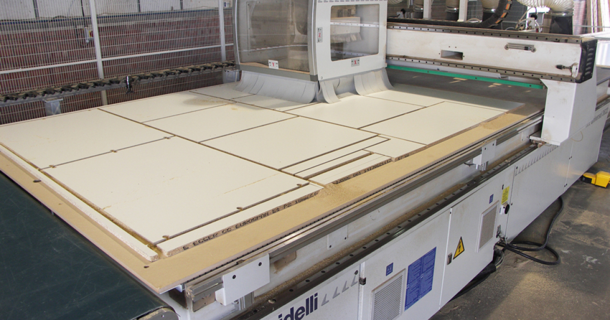 Completed nested panels at the outfeed of the Morbidelli Universal 3622 at BB Trade Kitchens