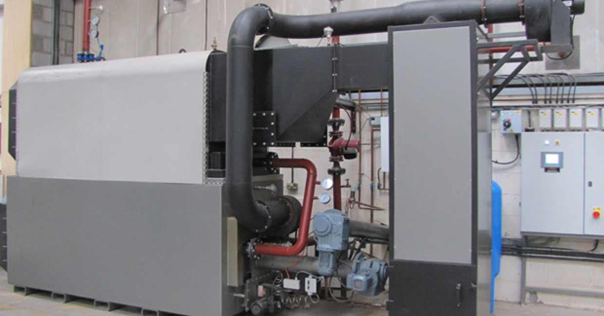 An immaculately-installed Wood Waste Technology biomass water boiler