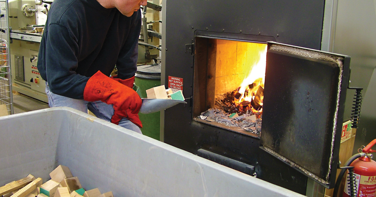 W10 wood waste heater produces 300,000 btu/hr of warm air