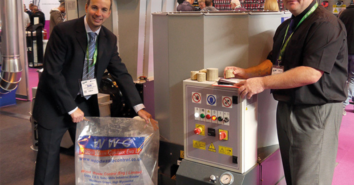 Andy Carter and Craig Gareppo with the new range of briquette presses and shredders on the Wood Waste Control stand at the W16 exhibition