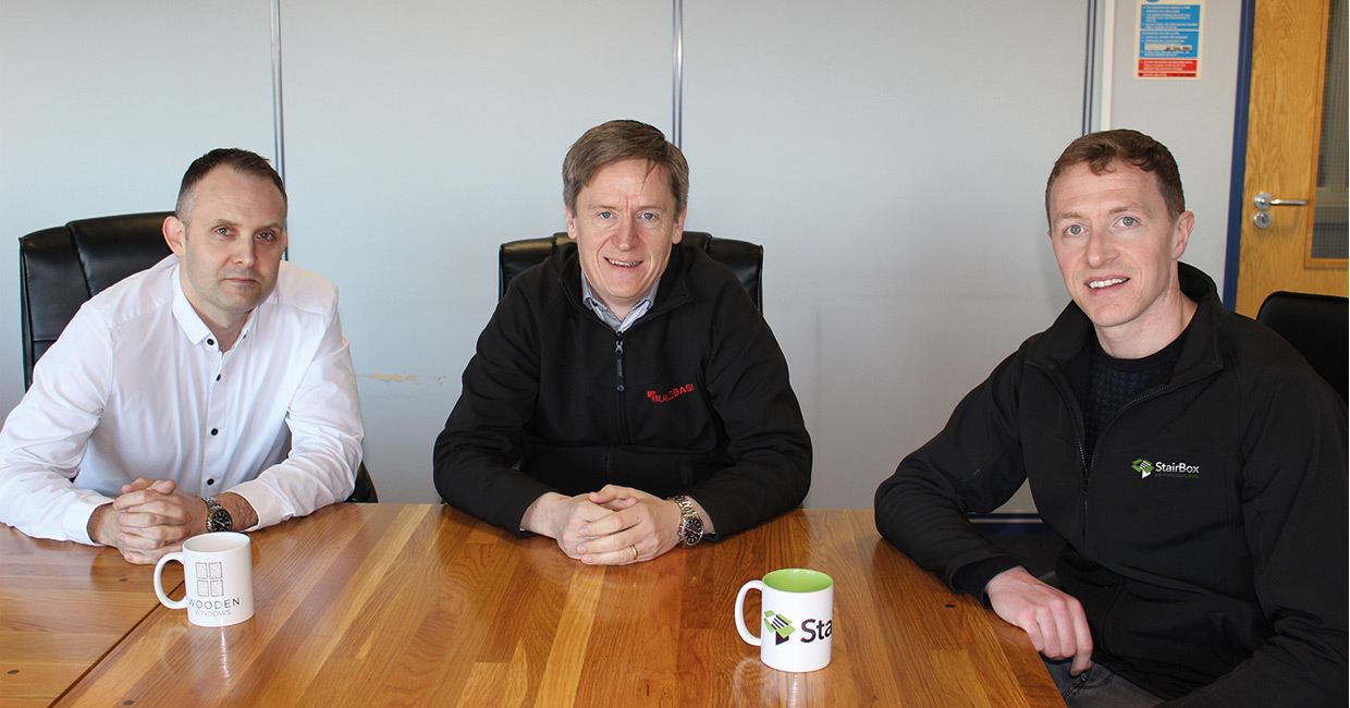 From left: Damian Stanley and Nigel Sharper from Buildbase with StairBox's Alex Hancock, celebrate the new partnership