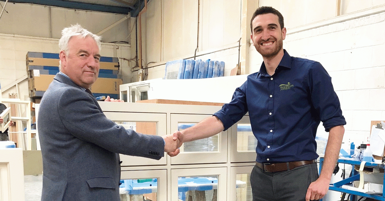 Gowercroft managing director Andrew Madge (right) with Tony Smith, UK and Ireland business development manager for Pilkington finalise the appointment in the Gowercroft workshop in Alfreton, Derbyshire
