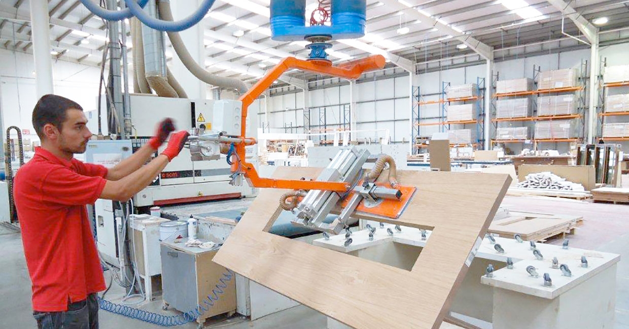 Vacuum tube lifting for industrial wood processes 